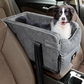 gray dog console car seat